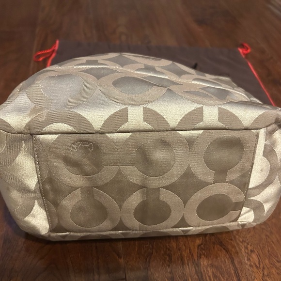 Authentic Coach Tan Signature Shoulder Bag
Has light pink interior - Picture 3 of 3